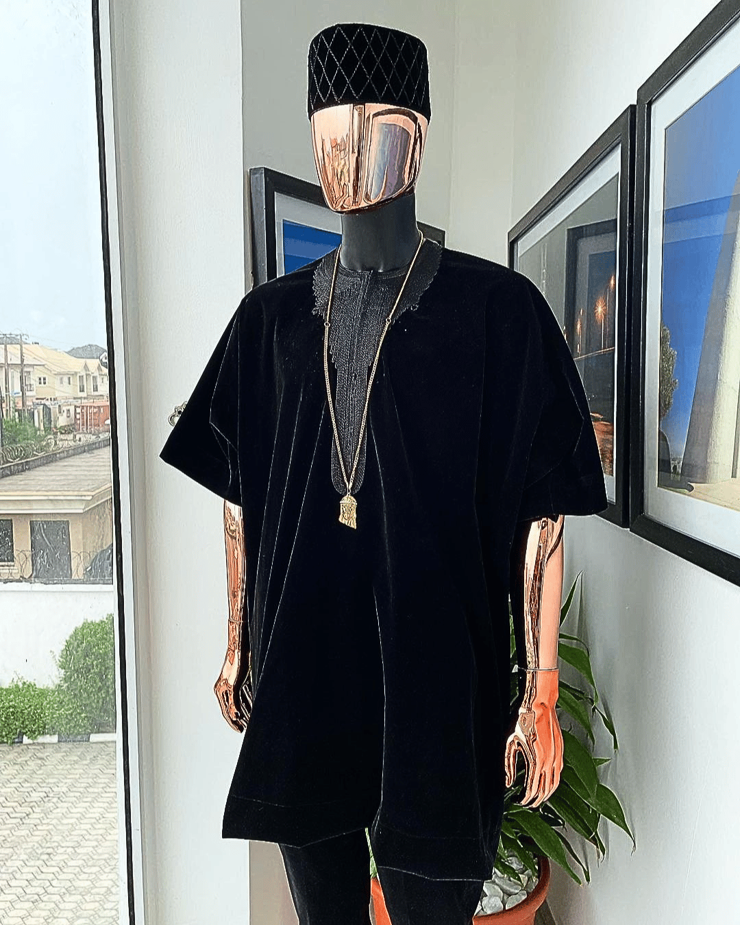 A charcoal black daftan from soaked Italian velvet fabric with a cross section matching marked hat