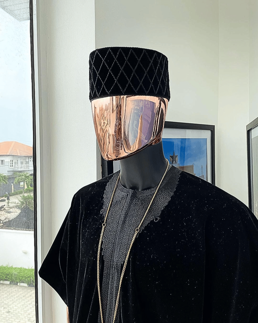 A charcoal black daftan from soaked Italian velvet fabric with a cross section matching marked hat