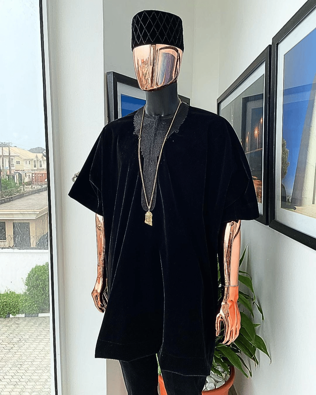 A charcoal black daftan from soaked Italian velvet fabric with a cross section matching marked hat