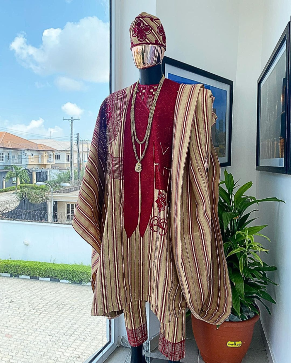 A Stripe champagne gold, cream, burgundy, aso oke regal agbada